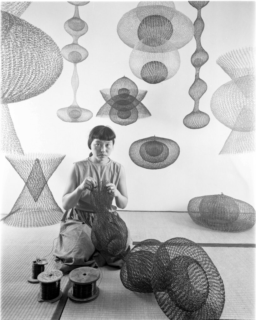 Artist Ruth Asawa making wire sculptures, 1954. © 2026 Ruth Asawa Lanier, Inc., Courtesy David Zwirner
